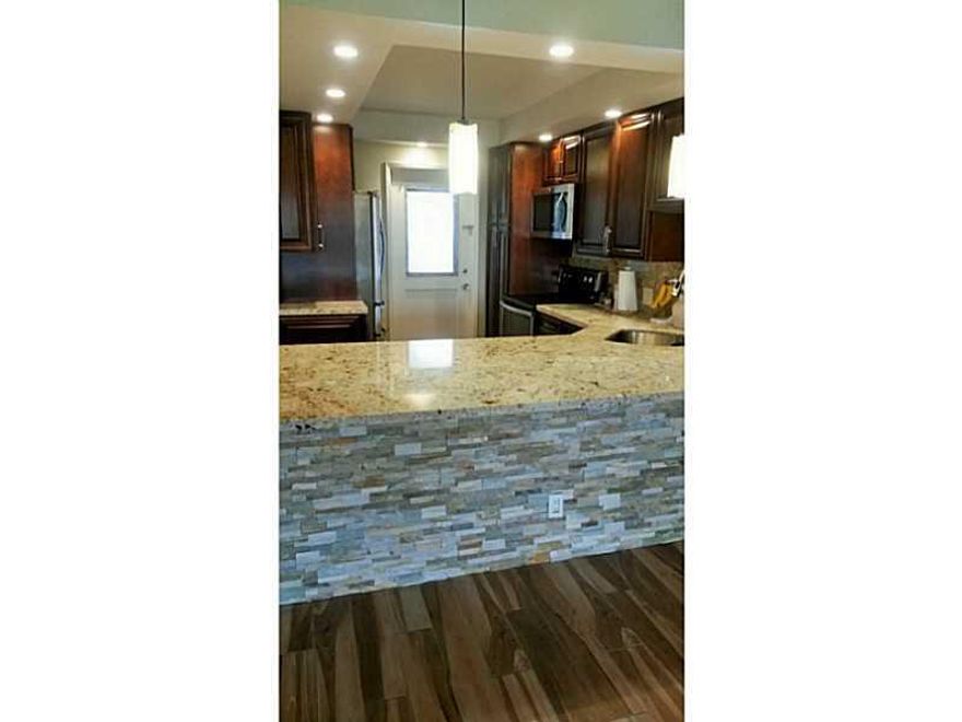 Great 2/2 corner apartment with den/3rd bedroom, golf course view, beautiful new kitchen with new cabinets and granite counter and SS appliances. Remodeled master bath and guest bath.    Near community pool, close to shopping, highways and casino.