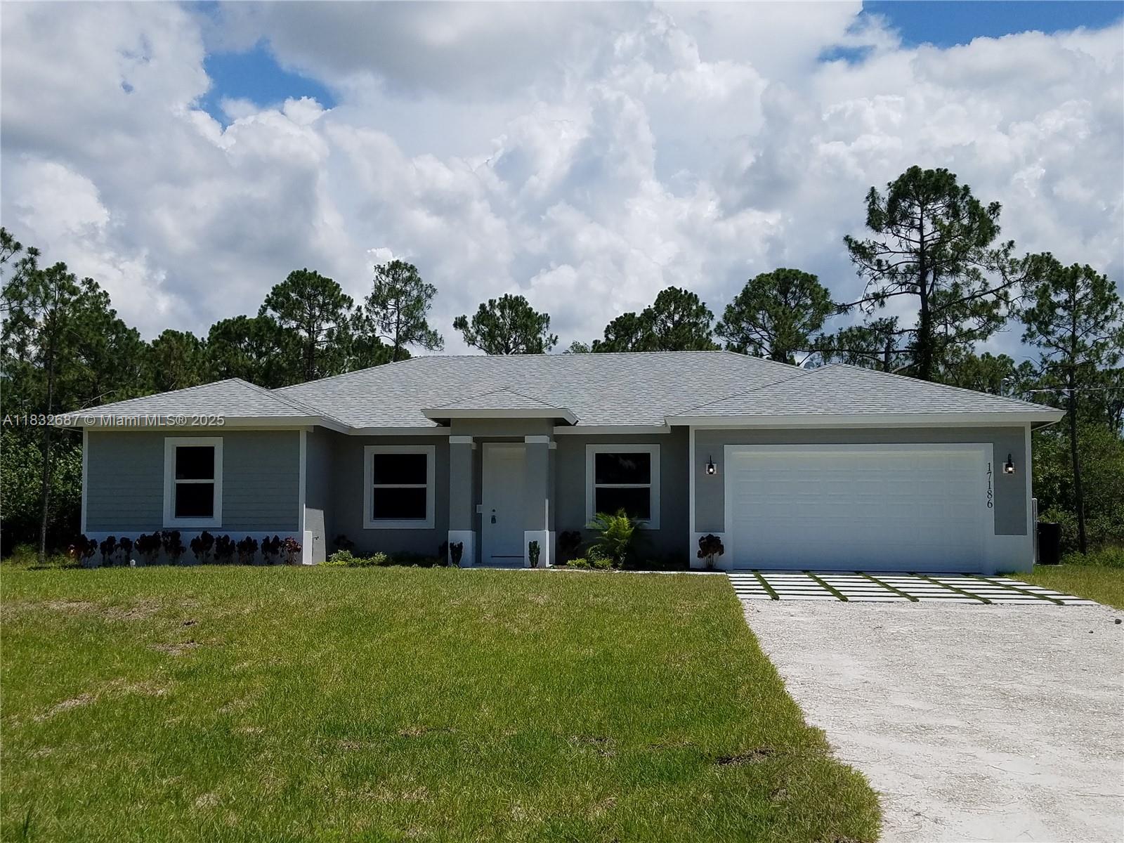 BEAUTIFUL 4-BEDROOM/2-BTH SPLIT FLOOR-PLAN WITH JUST OVER 1-ACRE AND NO HOA FEE! HOME FEATURING A SPLIT LAYOUT WITH AN OPEN LIVING CONCEPT - GREAT FOR ENTERTAINING! FULLY TILED; ALL IMPACT WINDOWS AND A-RATED SCHOOL DISTRICT. APPLIANCES ARE NEWER AND WASHER / DRYER HOOK-UP INSIDE HOME.