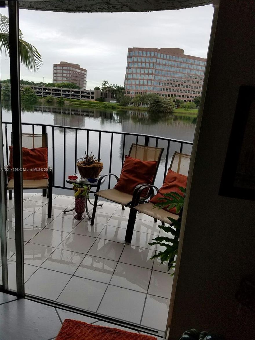 BEAUTIFUL 2/2 CENTRALLY LOCATED CONDO WITH GORGEOUS WATER VIEWS. WASHER AND DRYER IN UNIT, SECURITY, ASSIGNED AND  PLENTY GUEST PARKING CALL NOW