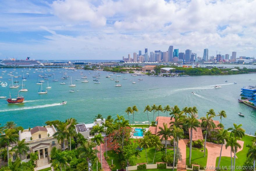 Prestigious downtown sunset views from this rarely available 13,382 SF pie-shaped lot with 104' of waterfront as per survey. Towering palms at entrance create and impressive entrance, and the lot has been cleared to make way for you to build your dream home. Located in the City of Miami you can get approved for over 8,500 sq foot of new construction home. Being equal distance between downtown Miami, Brickell, South Beach and Design District you can walk or bike at your leisure.