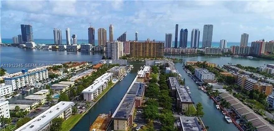 This spacious two-bedroom, two-bathroom condo offers a canal view and a deeded 26-foot dock. Perfect for updating and personalizing to your taste. Spacious kitchen. The master bedroom has a walk-in closet. The building has recently undergone a comprehensive 50-year inspection, which included a new roof, balcony restoration, elevator upgrades, a renovated parking lot, and a refreshed seawall. The clubhouse offers a pool, gym, sauna, and library. The Homeowners Association (HOA) fee covers water, cable, trash, and internet. This is a 55+ community, and rentals are not permitted during the first year. The condo is conveniently located just a short walk from the beach, restaurants, shopping, and grocery stores. Residents can also take advantage of the city’s free trolley service.