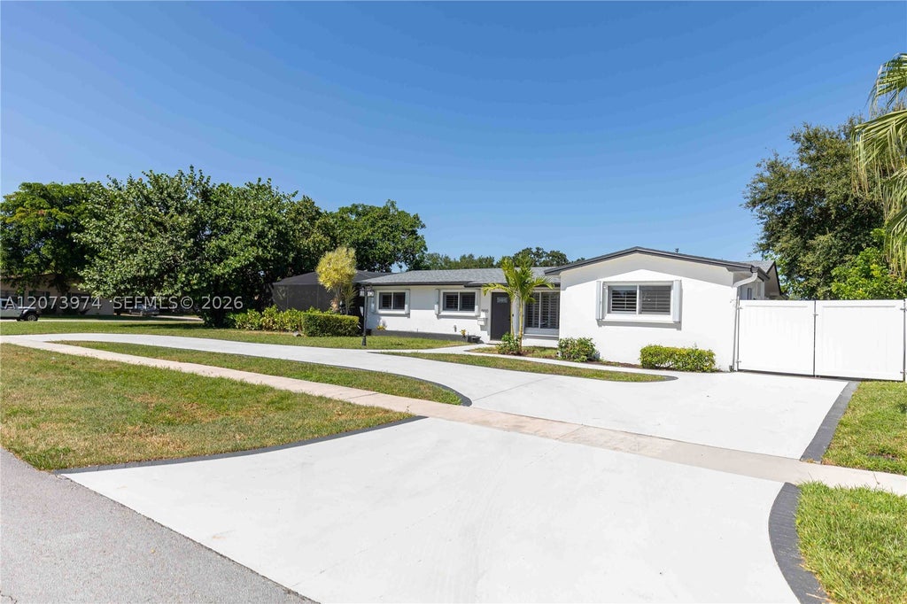 Photo of 1900 NW 82nd Ter, Pembroke Pines, FL 33024 (MLS # A12073974)