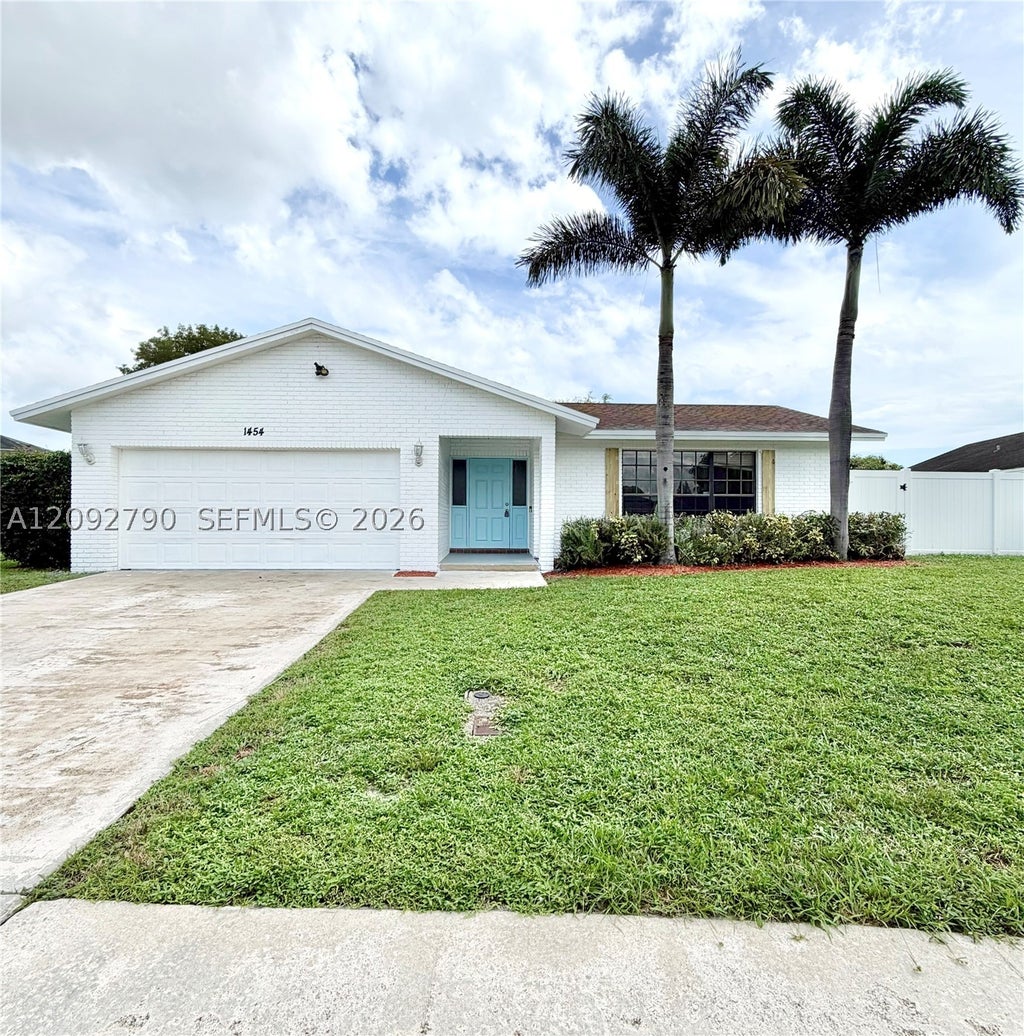 Photo of 1454 SW 26th Ave, Deerfield Beach, FL 33442 (MLS # A12092790)