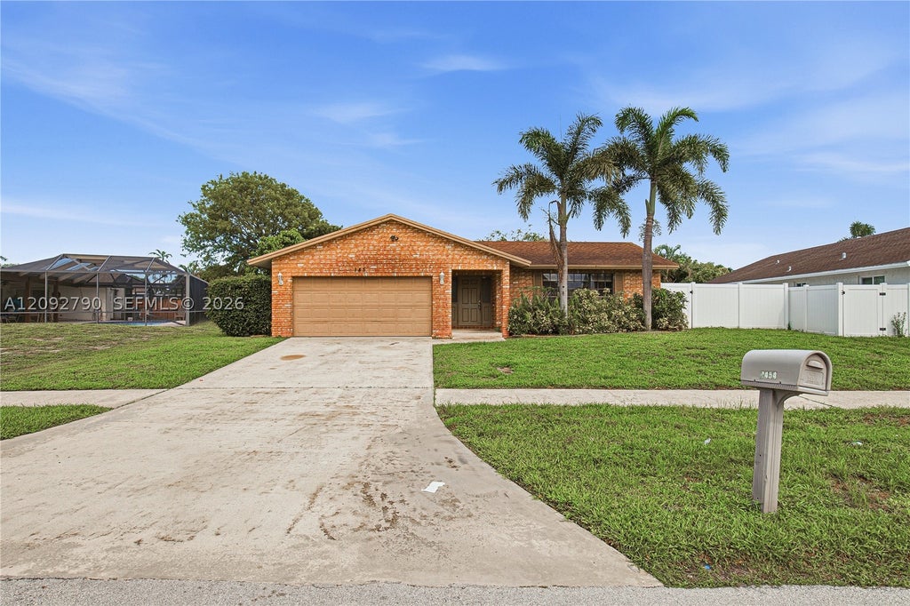 Photo of 1454 SW 26th Ave, Deerfield Beach, FL 33442 (MLS # A12092790)