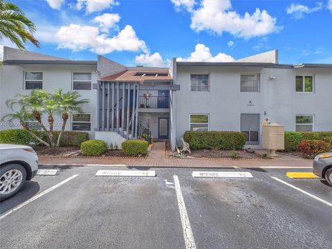 Photo of 14873 Cumberland Dr #1040, Delray Beach, FL 33446 (MLS # A11980813)