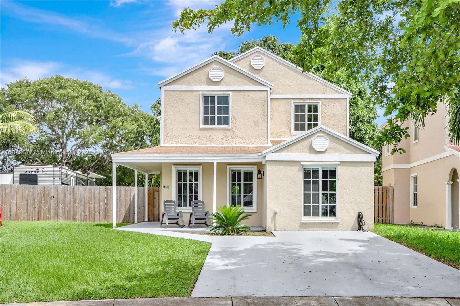 Deerwood Beautifully renovated move in ready 2-story 3 bed/3 bath Single family home near Zoo Miami. Spacious open floor plan with family room, dining area. Gorgeous new gourmet kitchen with gold & white granite countertops/backsplash, brass finishes, pot filler, large island with tons of storage, wine cooler. Built-in bar area with retractable TV. Home features impact windows/doors, new porcelain flooring on 1st floor, 2 remodeled baths, roomy bedrooms, 2022 AC. Outdoors enjoy a patio, shed, and large fenced yard with fruit trees. A 60-ft gate offers access for boat/trailer with electric & water hookups for outdoor kitchen. Conveniently located near Super Walmart, dining, Starbucks, new LA Fitness, close to great schools and 5 minutes to highways! Easy to show!!