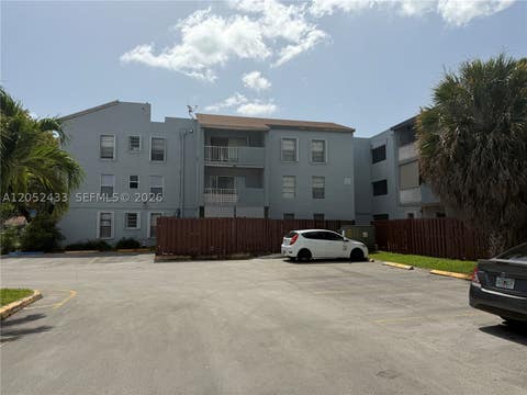Photo of 6095 W 18th Ave #S306, Hialeah, FL 33012 (MLS # A12052433)