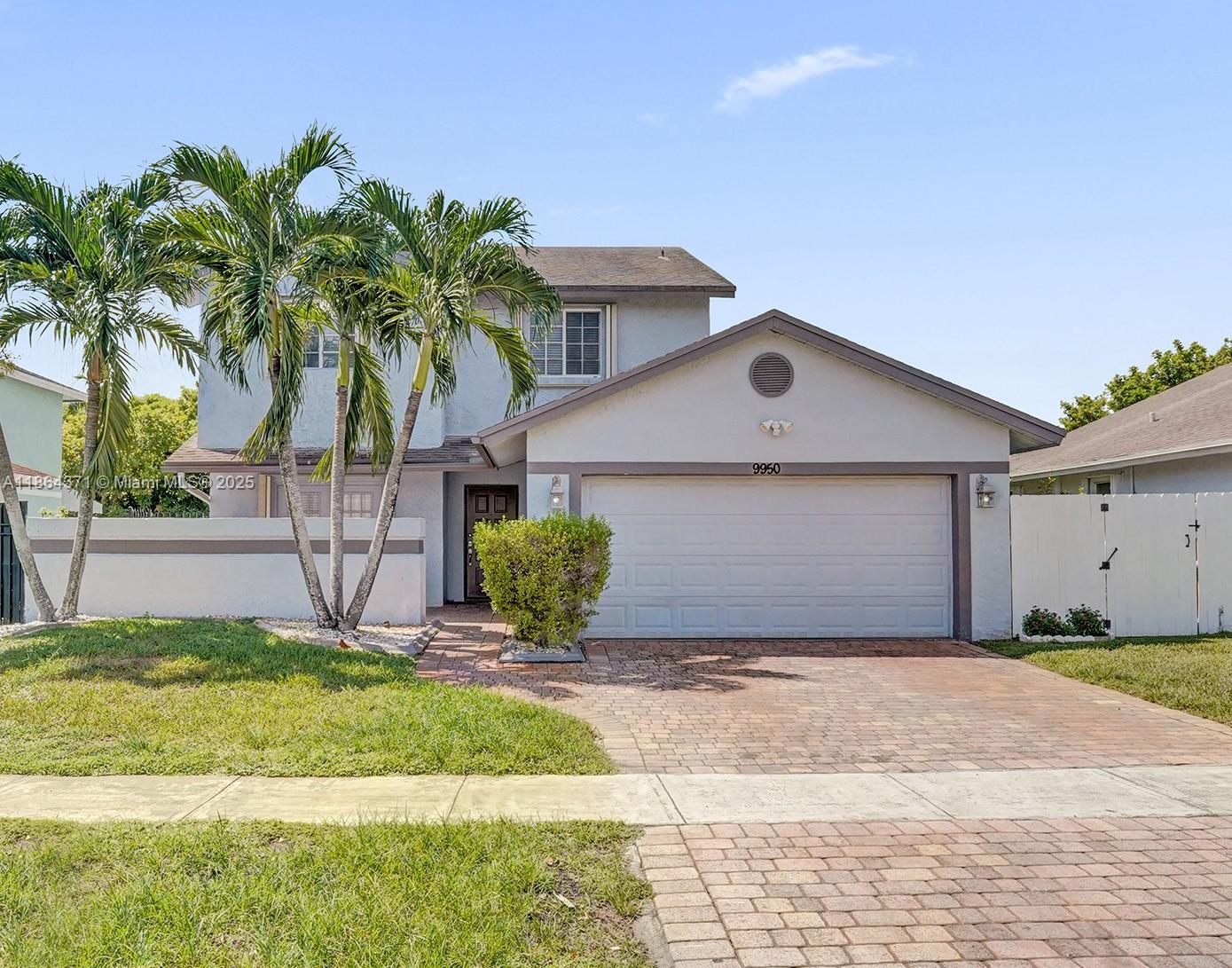 RUN to see this immaculate Pembroke Pines home in lovely Lakeside Key! With 4 bedrooms, 2.5 baths, a spacious living room, family room and dining area, this home should not be missed! All bedrooms upstairs, both full baths have been tastefully updated. The primary bedrooms features an en-suite bath with spa-like features, separate shower and soaking tub, dual vanities and TONS of storage space. The home features a front porch, large backyard with pool and lots of room for outdoor entertaining. Have peace of mind in this family friendly neighborhood with A-rated schools nearby. Be close to the best shopping and dining in Pembroke Pines.