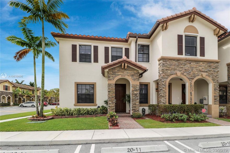 Fantastic opportunity to own this well-maintained 2/2.5 corner townhouse located in the Martinique community in Isles at Oasis. This beautiful home features tile in living area and wood laminate in the bedrooms. Modern eat-in kitchen with wood cabinets, stainless steel appliances, and recessed lighting. This gated community is complete with a clubhouse, swimming pool, and gym. A must see to appreciate. Call for a showing today.