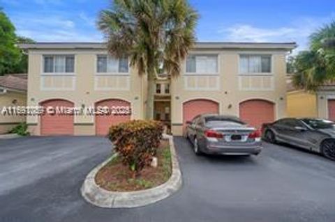 Photo of 2493 Centergate Dr #102, Miramar, FL 33025 (MLS # A11691059)