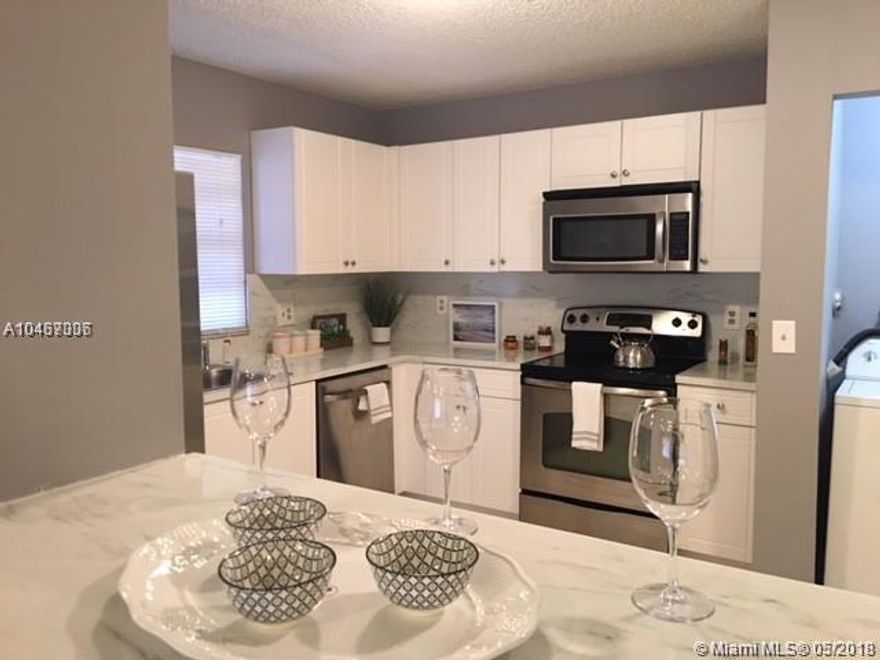 Renovated 3/2 IN GRENADIER LAKES!, 3 BEDROOM AND 2 BATHROOM ON GROUND LEVEL, KITCHEN AND PATIO, MASTER BEDROOM AND LIVING ROOM AREA. WASHER AND DRYER INSIDE THE UNIT. CONDO FEATURES COMMUNITY POOL AND TENNIS COURTS/ GREAT LOCATION, ALL AGES WELCOME!