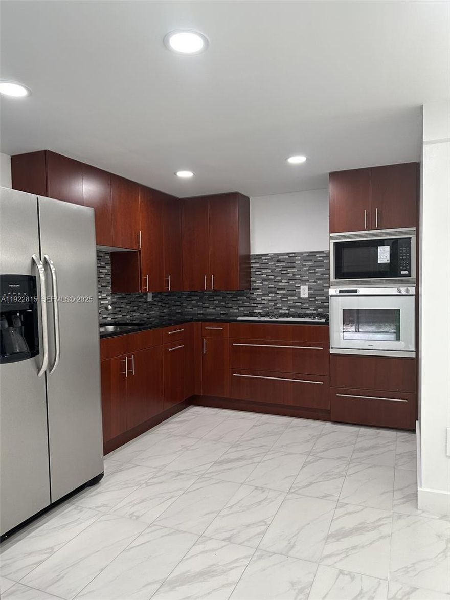 FOR RENT: Bright and spacious 2-bedroom, 2-bath townhouse in the gated community of Snapper Village. Featuring 1,330 SqFt  of living space, this updated home includes a renovated kitchen with granite countertops, ample cabinet storage, remodeled two modern bathrooms and appliances. Enjoy new floors,  a large primary suite with walk-in closet, in-unit washer/dryer. The private fenced patio is perfect for outdoor entertaining. Community offers resort-style pool, 24-hour security, and ample guest parking. Water, sewer and basic cable included. Zoned for A-rated schools. Convenient to shopping, highways, and more. Both bedrooms are upstairs.