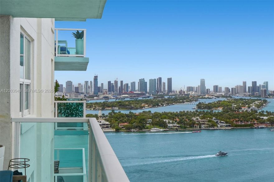 Corner 2-bedroom, 2-bath residence at The Floridian with wide open views of the ocean, Miami Beach, and skyline from every angle. This bright, spacious layout is filled with natural light and features a wraparound balcony, large living and dining areas, wood flooring in the bedrooms, stone tile in the main living spaces, in-unit washer/dryer, and ample closet space including a large walk-in closet in the primary suite. The kitchen offers granite countertops, stainless steel appliances, and generous storage. The Floridian is a full-service bayfront building with 2 pools, tennis, gym, spa, salon, market, valet, concierge, and 24-hour security. Prime West Avenue location across from Canopy Park and near South of Fifth, Lincoln Road, Whole Foods, and Miami Beach dining and shopping.