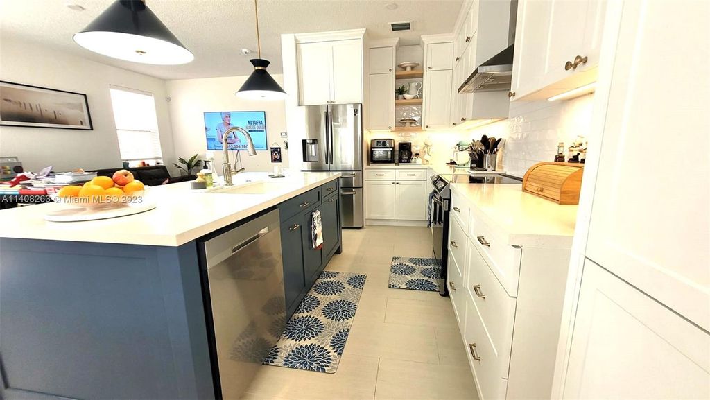 Photo of 241 NW 154th Ave, Pembroke Pines, FL 33028 (MLS # A11408263)