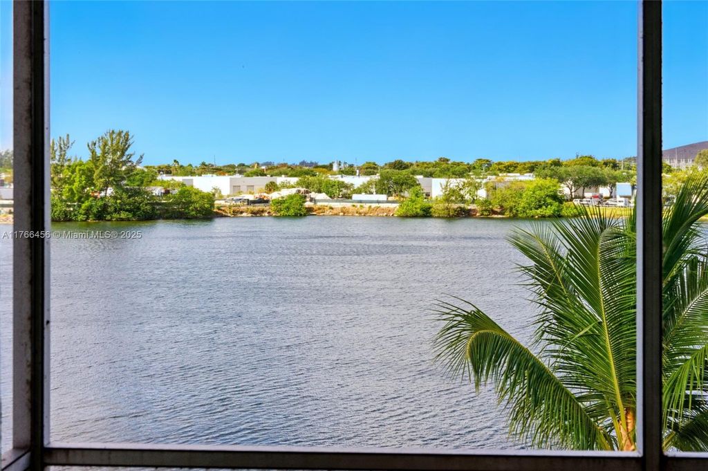 Photo of 4311 Crystal Lake Dr #413, Deerfield Beach, FL 33064 (MLS # A11766456)