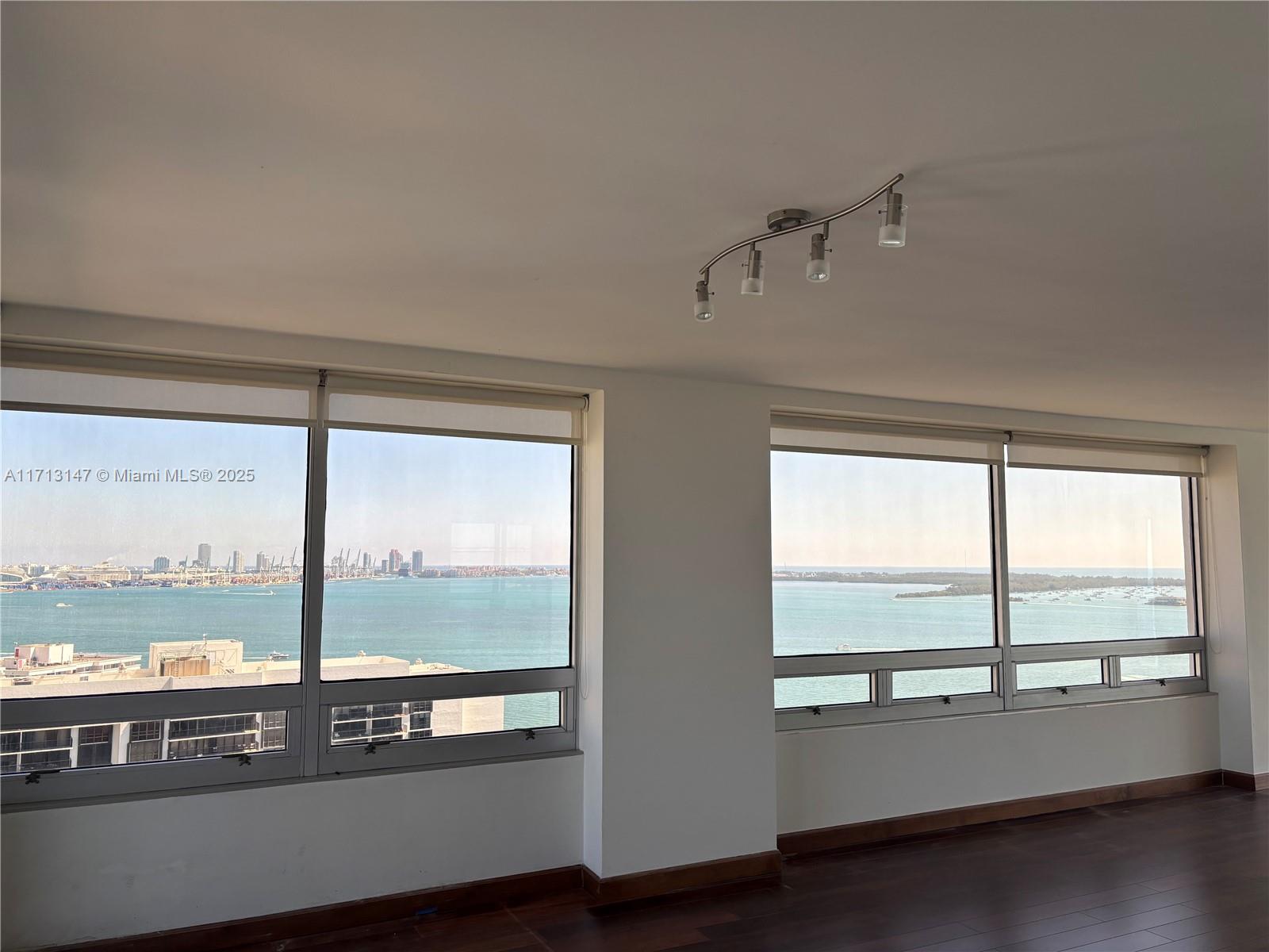 Corner Unit. Area is bigger that recorded as one balcony has been enclosed , balcony doors storm proof. Elevate your lifestyle with this luxurious Brickell apartment, where breathtaking bay and city views set the stage for elegant living. This 2-bedroom, 2-bathroom residence features a spacious flow-through layout, with the master bedroom offering ocean views. Laminated floors and walk-in closets, designed for both comfort and style. Enjoy exclusive privacy with only two units per floor, 24-hour concierge service, and valet parking. Indulge in resort-style amenities: tennis courts, a children'splayground, a heated pool, jacuzzi, BBQ area, a state-of-the-art fitness center, and bicycle storage. Desing by renowned Arquitectonica.