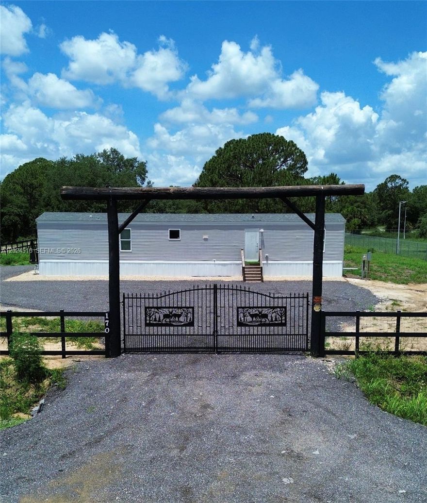 Brand-new 3 bed, 2 bath manufactured home permanently affixed on a spacious 1.25-acre corner lot. FULLY FURNISHED and MOVE-IN READY, with covered patio roof to be installed over deck. Property recently improved with new home installation and permits completed per seller. NO HOA.