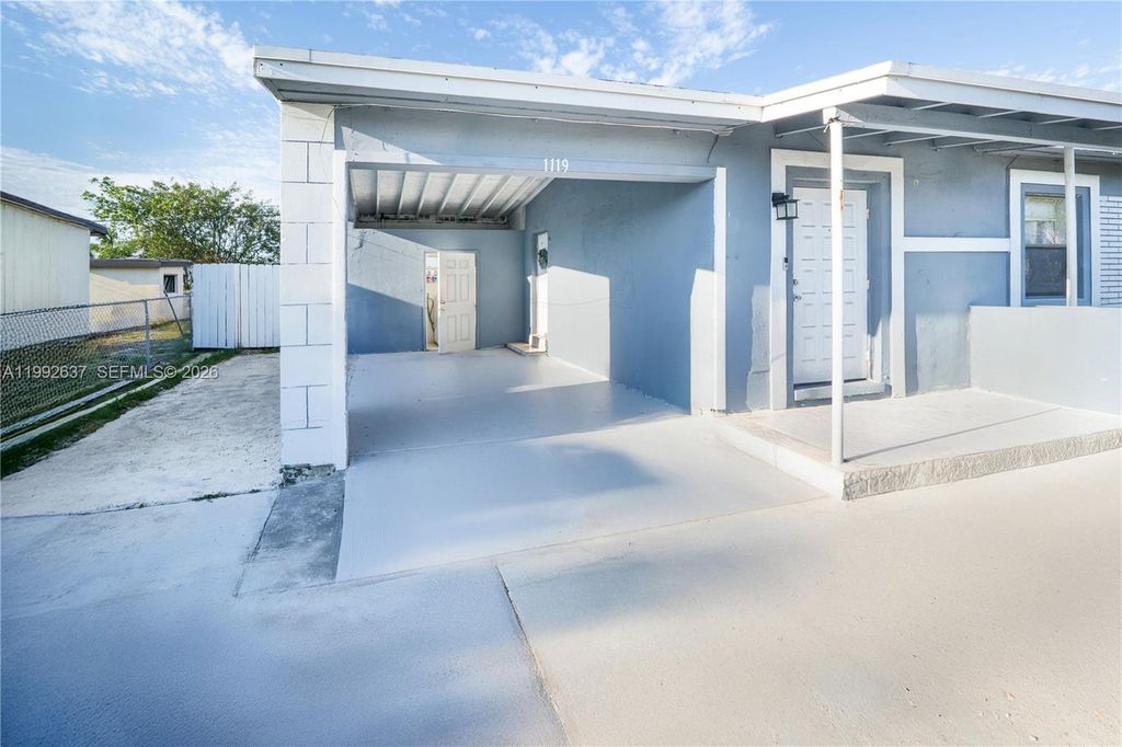 Photo of 1119 NW 10th Pl, Fort Lauderdale, FL 33311 (MLS # A11992637)