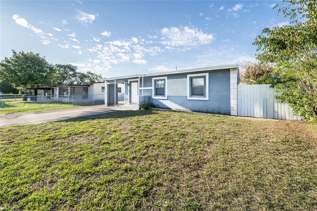 Photo of 1119 NW 10th Pl, Fort Lauderdale, FL 33311 (MLS # A11992637)