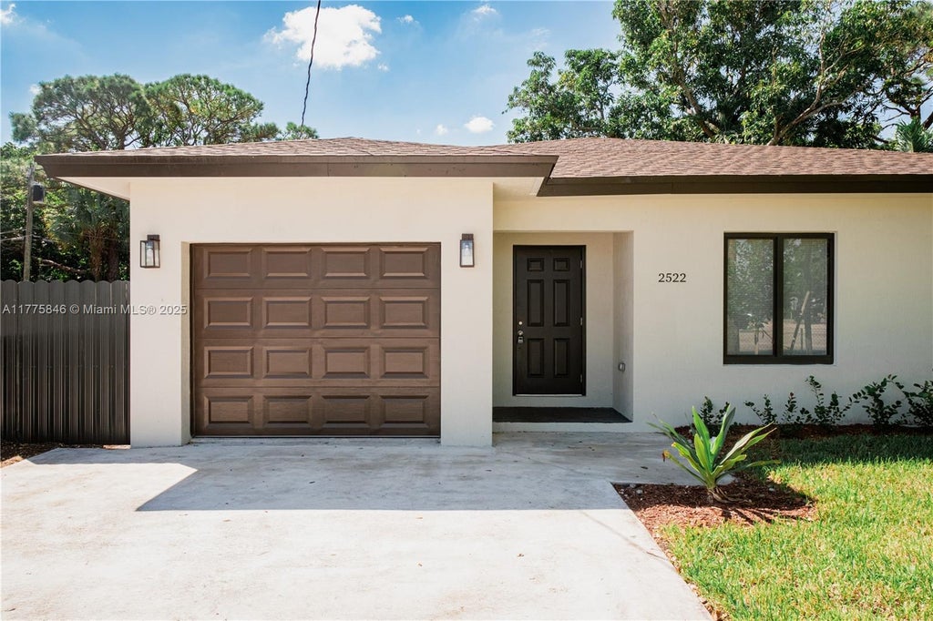 Photo of 2522 NW 9th Pl, Fort Lauderdale, FL 33311 (MLS # A11775846)