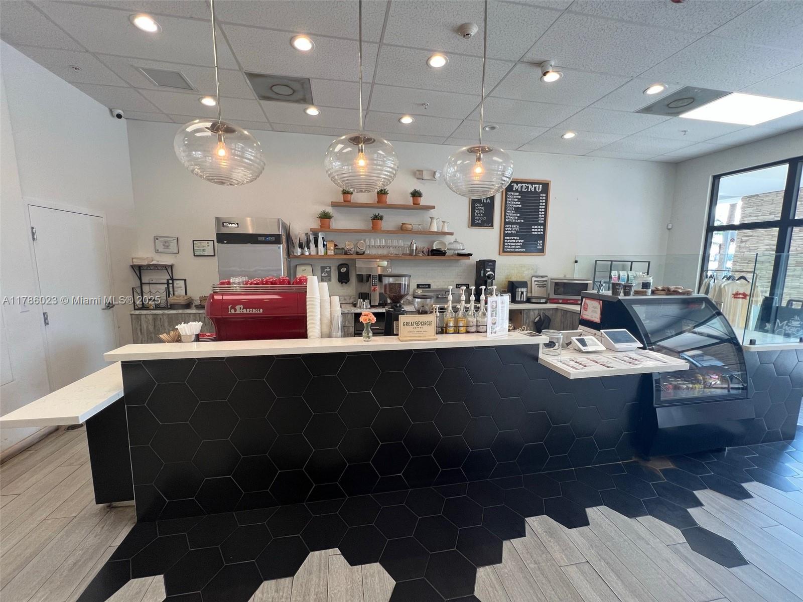 Here's your chance to own a beautifully built-out 1,800 sq ft coffee shop in the heart of Miami. This fully equipped space features a grease trap, full commercial kitchen, dedicated storage area. And a layout designed for efficiency and charm.
Perfect for a cafe, bakery, or restaurant concept, the interior blends modern aesthetics with a welcoming vibe that keeps customers coming back. Turnkey setup and ready for your brand or vision to take over seamlessly.