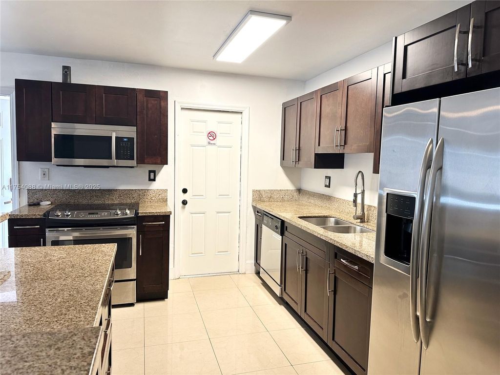 Photo of 1548 SW 5th Pl #4, Fort Lauderdale, FL 33312 (MLS # A11754088)