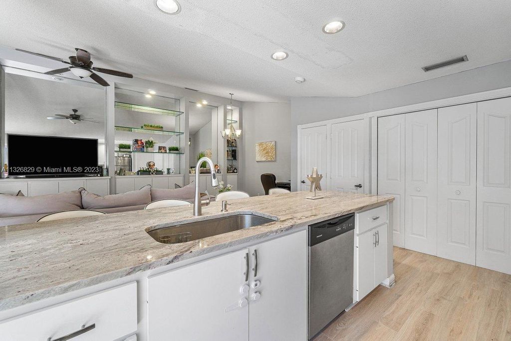 Photo of 9041 Sun Terrace Cir #D, Palm Beach Gardens, FL 33403 (MLS # A11326829)