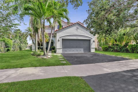 Photo of 1216 Chinaberry Dr, Weston, FL 33327 (MLS # A12056158)