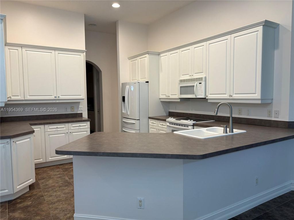 Photo of 18265 SE Ridgeview Dr, Tequesta, FL 33469 (MLS # A11954369)