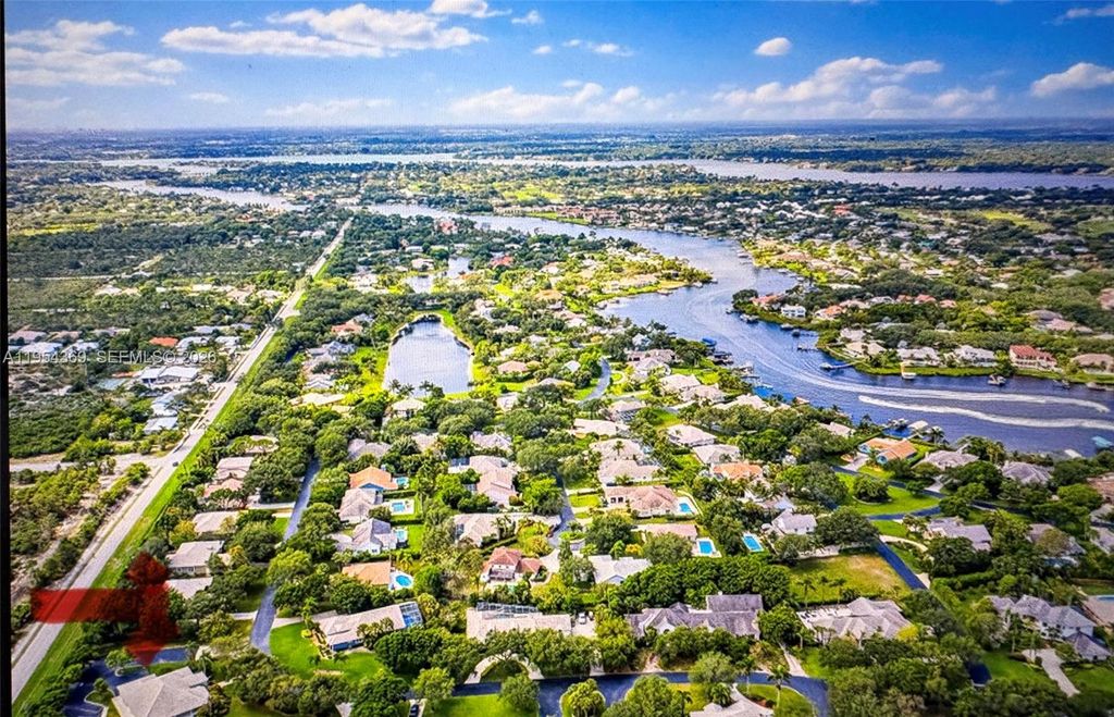 Photo of 18265 SE Ridgeview Dr, Tequesta, FL 33469 (MLS # A11954369)