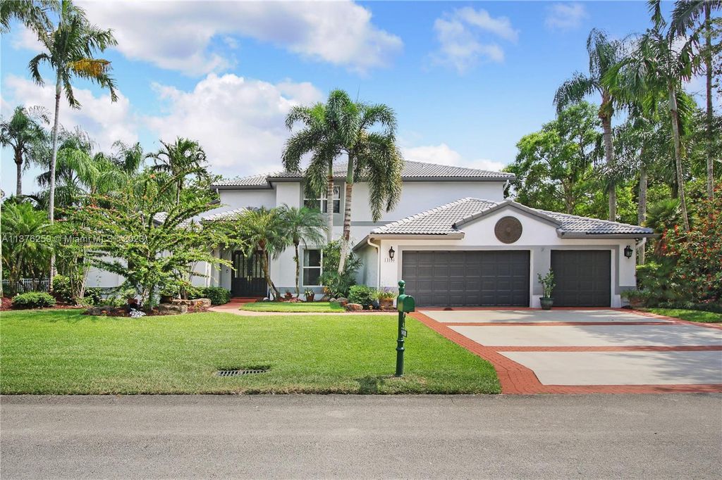 Photo of 14100 Carlton Dr, Davie, FL 33330 (MLS # A11376259)