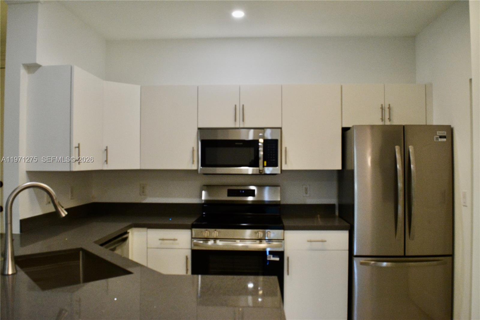EL-AD VILLAGGIO CONDO BLD - Residential Lease