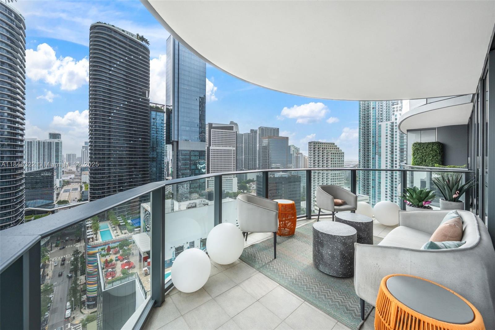 Welcome to Brickell Flatiron, one of the premier buildings in Brickell. This corner unit faces northwest, offering views of SLS Lux, Brickell Heights, and Mary Brickell Village. Featuring 2 bedrooms plus a den, it’s perfect for a home office or a casual lounge area, complete with a large wine fridge. The expansive wraparound balcony provides plenty of outdoor space to relax or entertain. Professionally designed and fully furnished with high end pieces, the unit has been meticulously maintained by its current owner. Highlights include a built-in speaker system, a soaking tub positioned by the window, and an overall sleek, modern feel. Restaurants, shopping, and grocery stores are all just a short 5 minute walk away.