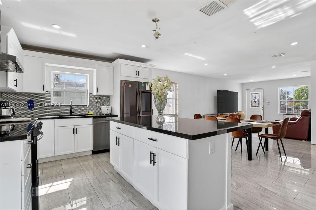 Photo of 681 NW 21st St, Pompano Beach, FL 33060 (MLS # A11995572)