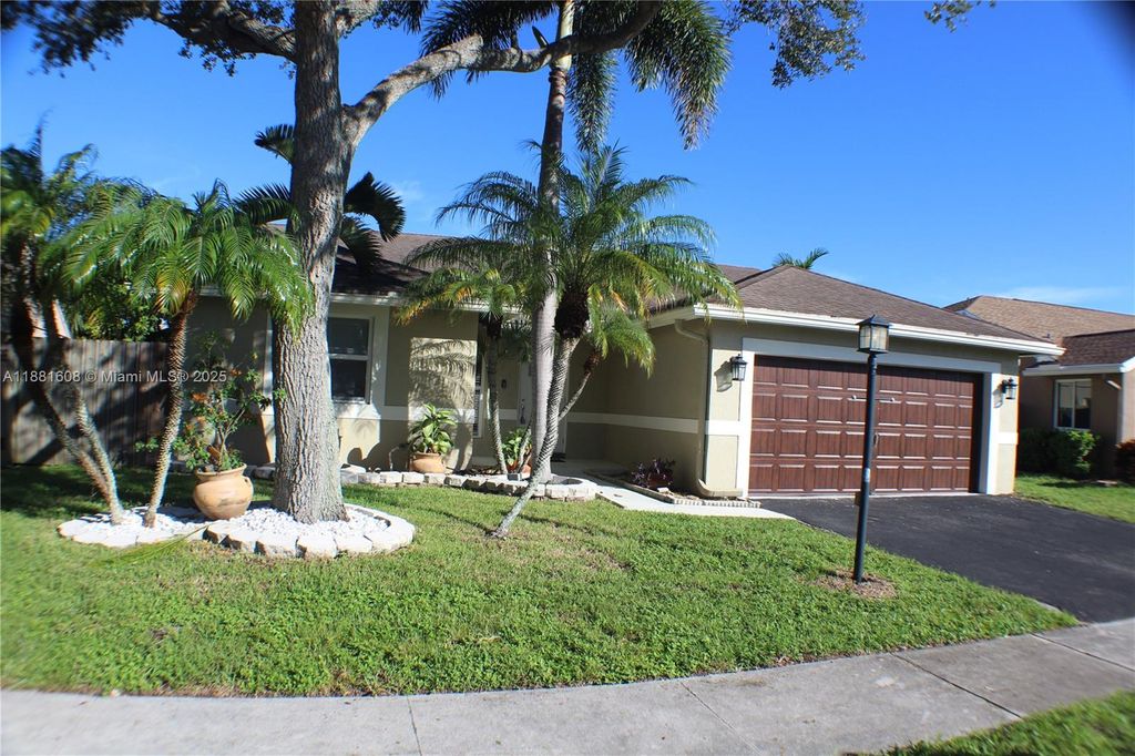 Photo of 1321 SW 151st Ter, Sunrise, FL 33326 (MLS # A11881608)