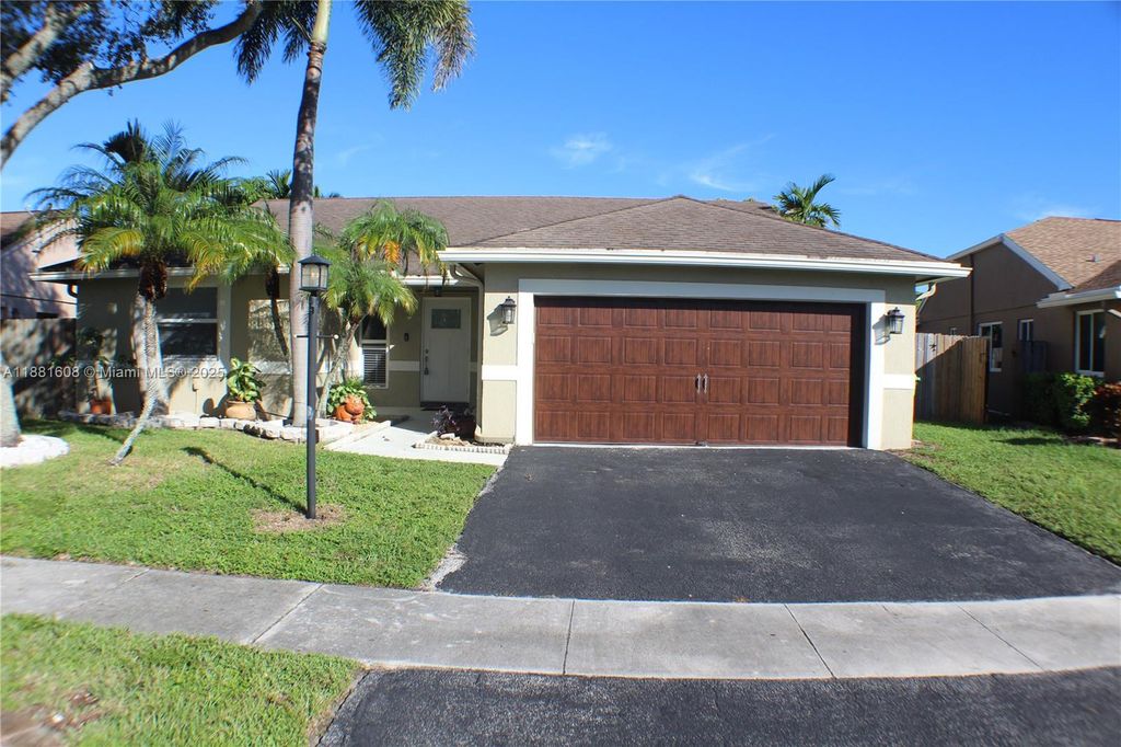 Photo of 1321 SW 151st Ter, Sunrise, FL 33326 (MLS # A11881608)