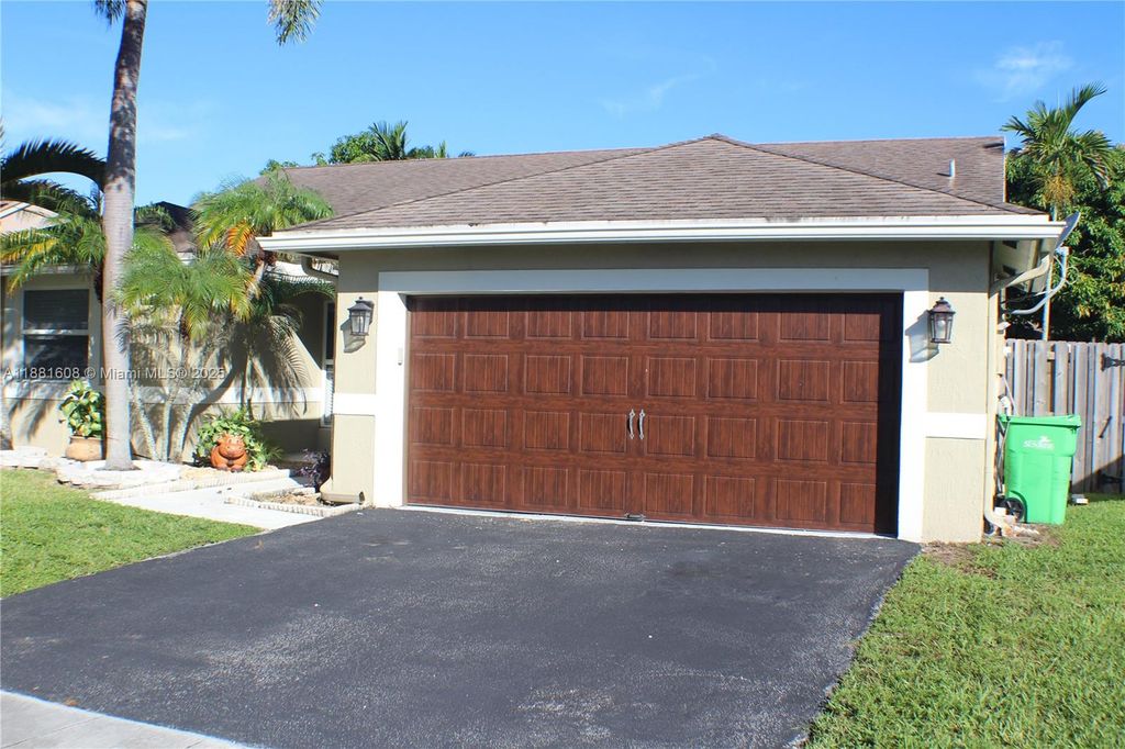 Photo of 1321 SW 151st Ter, Sunrise, FL 33326 (MLS # A11881608)