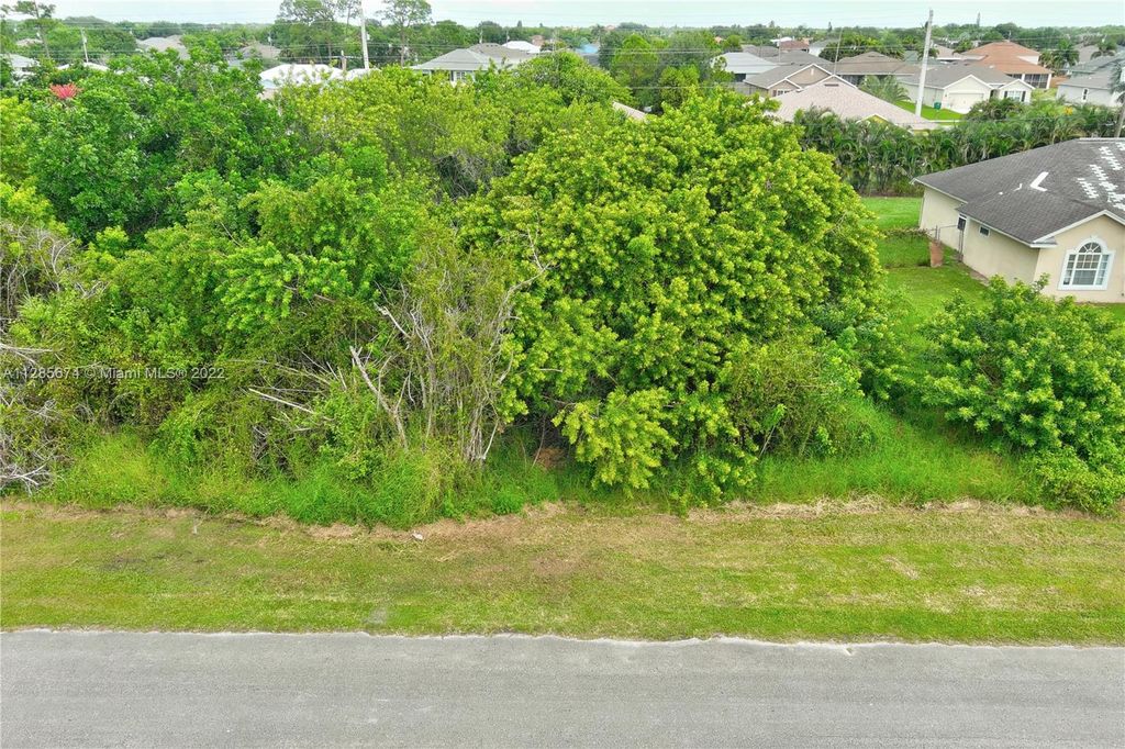 Photo of 573 SW Dailey Ave, Port Saint Lucie, FL 34953 (MLS # A11285674)