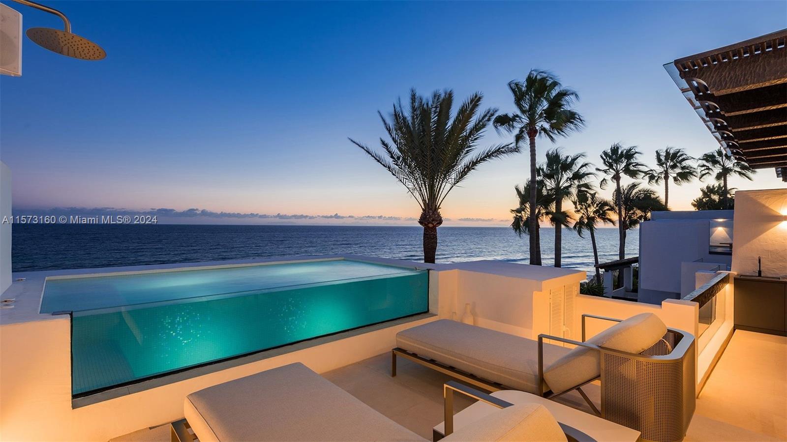 Property is located in Marbella, Spain. Located in Puente Romano Resort, the CORAL penthouse exudes luxury with its beachfront view, Alto Design Marbella’s renovation, and panoramic sea vistas. It features a spacious living area, stylish furnishings, and functional outdoor terraces with a dining space, relaxation areas, and a kitchenette. A highlight is the private pool facing the Mediterranean. Inside, four elegant bedrooms each have an ensuite, especially the master bedroom with marble details and terrace access. Residents enjoy Persia Gardens’ security, proximity to the Golden Mile, and a lavish seaside lifestyle.