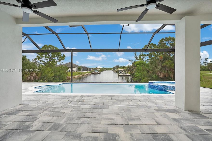 A brand-new 2025 waterfront masterpiece designed for those who live for the boating lifestyle, open water, and Southwest Florida luxury. This exceptional 4-bedroom, 3-bath residence sits on a rare Gulf-access canal, offering a level of exclusivity that few properties can match. From your backyard, you’re minutes away from open waters, island hopping, world-class fishing, and unforgettable sunsets — this is true Florida waterfront living. Step inside and experience a modern, open-concept design filled with natural light, high ceilings, and elegant finishes throughout. The gourmet kitchen seamlessly flows into the main living area, perfect for entertaining after a day on the water. Every detail reflects quality craftsmanship and contemporary coastal style. Outdoors is where this home truly shines. Enjoy your private heated pool and jacuzzi, surrounded by a spacious lanai that invites relaxation and entertainment year-round. Whether you’re cooling off after a boat ride or hosting friends for sunset cocktails, this outdoor space was designed to maximize the waterfront experience. Perfectly located near Pine Island Road and Matlacha, you’re close to vibrant waterfront dining, art galleries, and local marinas, while still enjoying the privacy of a quiet residential setting. Golf enthusiasts will appreciate the proximity to Coral Oaks Golf Course, one of Cape Coral’s premier public courses. This home is ideal for boat owners, , and anyone seeking the ultimate coastal lifestyle.