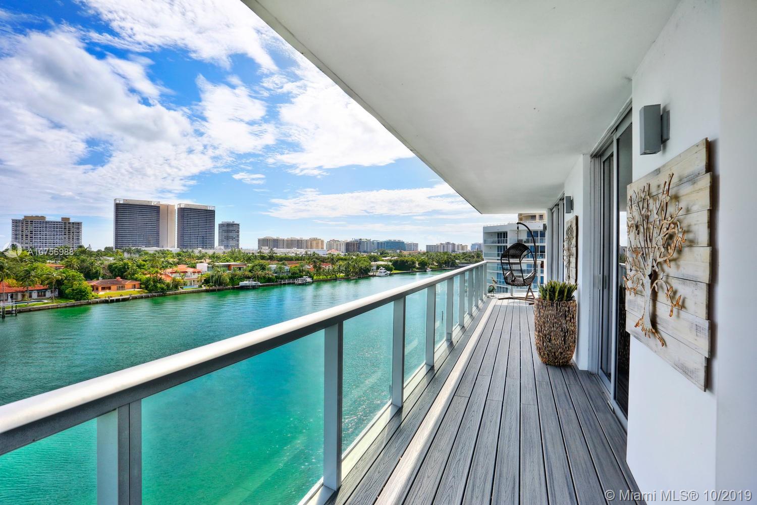 Enjoy island-style living in this luxury boutique building, built in 2016 & just a short walk to world-class shopping & dining and the beaches of Bal Harbour. Light-filled living spaces with Porcelain tile flooring , wrap-around balcony & walls of glass that overlook spectacular water views. Currently configured as a 1BR/2BA (owner will reconvert to a 2/2). Sleek, European-style kitchen features quartz countertops & top-of-the-line appliances. Unique building with only 17 residences (3 per floor) and it’s own private marina with direct ocean access. Resort-style rooftop deck with 360-degree water views, 45’ heated pool, sundeck & outdoor fitness area. (Unit has an assigned boat dock with an additional $275 association fee for maintenance) Murphy Bed excluded (can be negotiated into price)