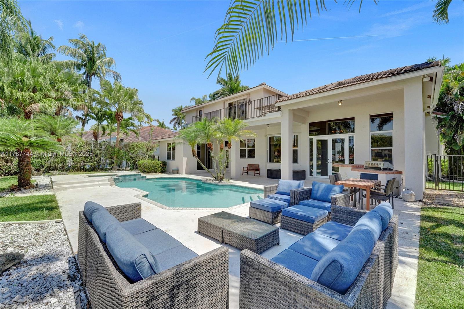 Located in Weston Hills, one of the most exclusive neighborhoods in Weston. This elegant property offers an unparalleled residential setting, surrounded by parks and access to the area's top schools.The house features spacious and bright spaces, including four comfortable bedrooms, a desk ideal for working from home or studying, and three full bathrooms. Its layout has been designed to provide comfort and privacy for each member of the household. A private pool extends toward a relaxing view of the golf courses, creating a perfect setting for relaxing and sharing with family or friends. This property represents a unique opportunity to live in a peaceful, safe, and nature-filled setting, while still being close to everything that makes life more comfortable and enjoyable.