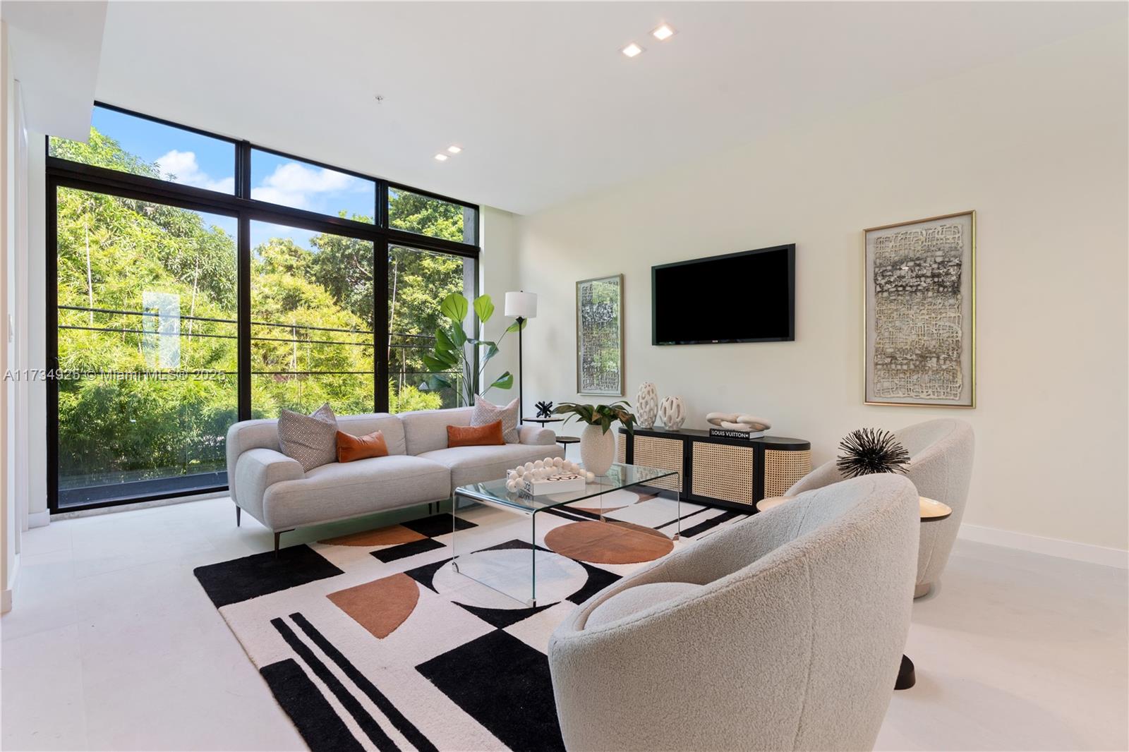 Discover the ultimate in contemporary living in this exquisite 3-story townhome featuring 3 bedrooms and 3 bathrooms. The sleek, modern design offers a seamless blend of style and functionality, complete with an open-concept layout and a private rooftop terrace. Ideally located in Silver Grove, just steps from Grove Central Station, with easy access to the University of Miami, Brickell, and Miami International Airport.Whether you're looking for the perfect home or purchasing as an investment, this townhome is an exceptional opportunity. Schedule your private tour today to experience the future of urban living