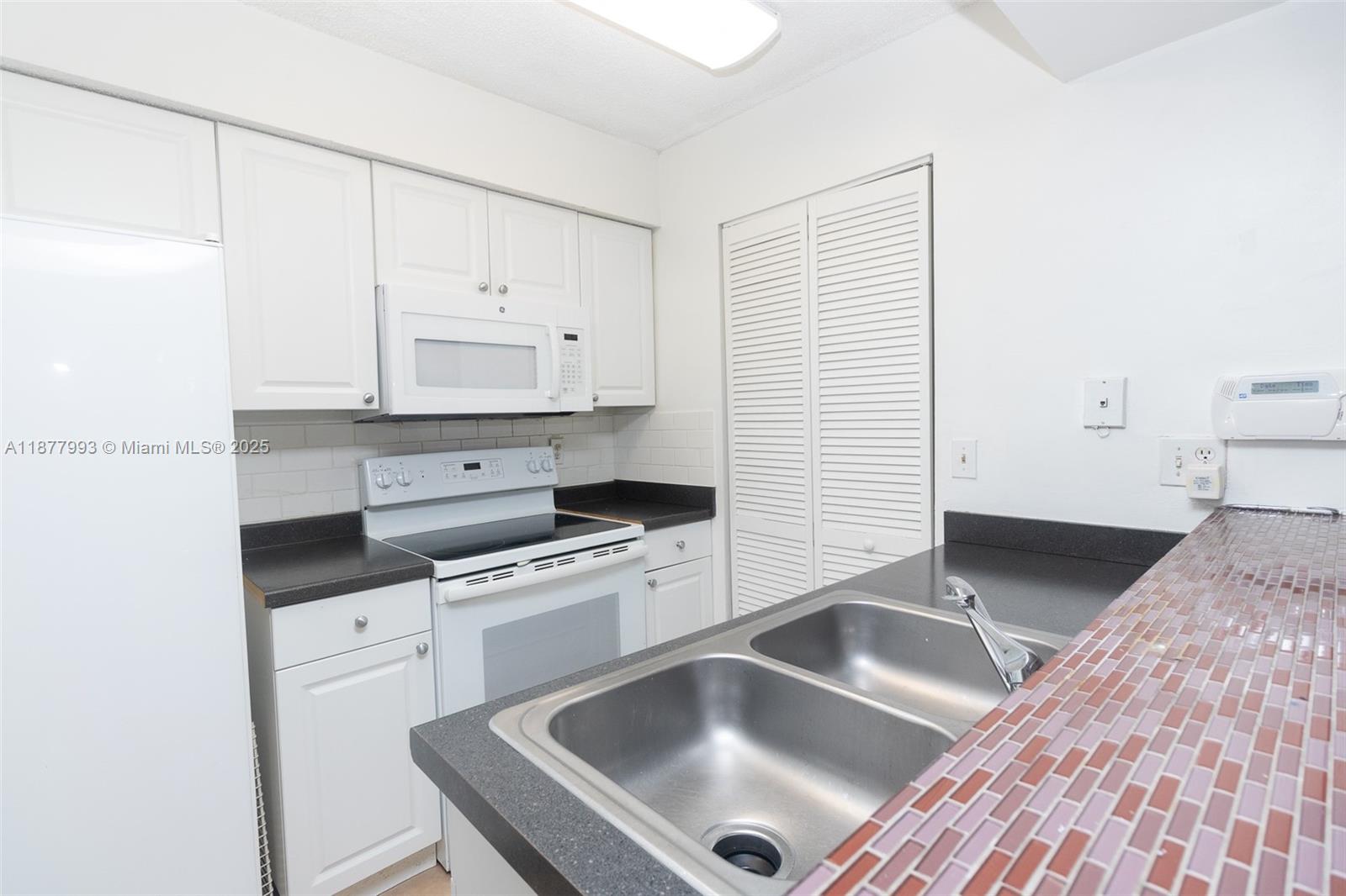 This beautiful 1bedroom , 1bathroom located in a quiet gated community with pool, gym, tennis court & club house, could be yours! This property is conveniently close to shopping, restaurants and highways. HOA Approval required. Washer and Dryer inside of the Unit. Water is included. Pets are welcome with a one-time pet fee no-refundable. First month and Two security deposits required to move in.