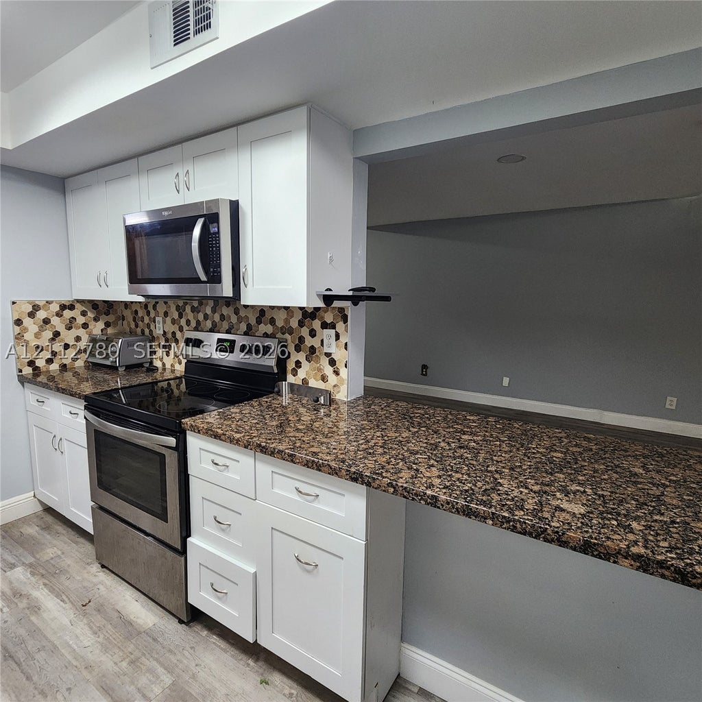 Photo of 11011 S Lakeview Dr #11011, Pembroke Pines, FL 33026 (MLS # A12112780)
