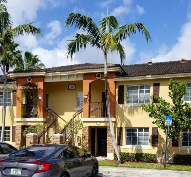Beautiful First Floor Unit in Nice Community ,Don't miss the opportunity to live at MALIBU BAY community! Discover this charming and meticulously maintained gated community, guard at the entrance. Close to Florida Turnpike, Shopping and Restaurants. Clubhouse, Pool and Gym .Great for First home buyers and Investors.