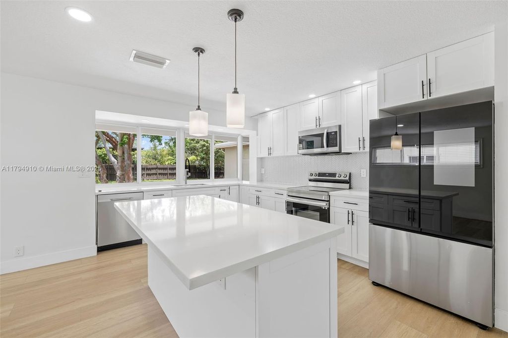 Photo of 4401 Madison St, Hollywood, FL 33021 (MLS # A11794910)