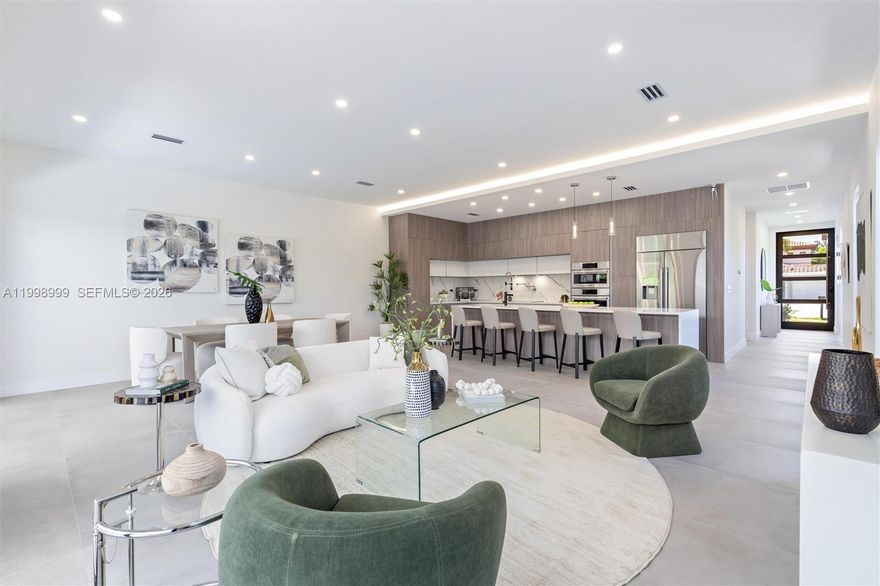 Newly constructed modern residence in the heart of Fort Lauderdale’s desirable Coral Ridge neighborhood, offering refined design and effortless indoor-outdoor living. These 2,557 square foot home features 4 bedrooms, 5 bathrooms, a private den, and a full-size laundry room. Crowning the home is an expansive rooftop terrace, its defining feature, complete with a summer kitchen, jacuzzi ready hookups, and panoramic skyline and sunset views, creating a rare and elevated setting for entertaining and relaxation. Sun filled interiors showcase soaring ceilings, walls of glass, sleek flooring, quartz countertops, and curated designer finishes throughout. The chef’s kitchen is anchored by an oversized island and outfitted with premium Dacor and Bosch appliances, flowing seamlessly to the poolside terrace for everyday living and entertaining. Ideally situated just minutes from Fort Lauderdale Beach, Galleria Mall, Las Olas Boulevard, and premier dining and shopping, with easy access to downtown Fort Lauderdale and major roadways.