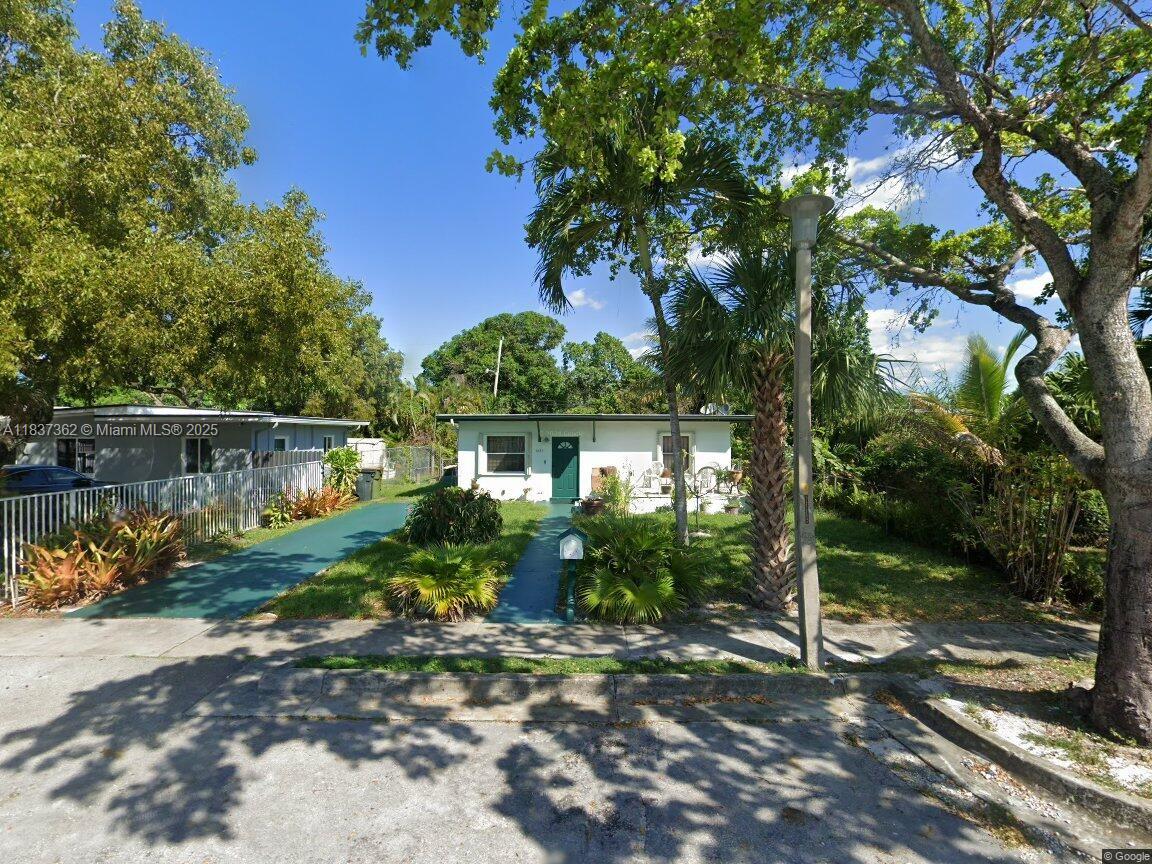 Adorable 2/1 in highly desired Sunkist Groves. Approx 1103 Sq Ft Home on a 6750 sq ft Lot. Home can easily be expanded if Buyers wishes. Great Area close to all major throughfare's. Minutes to South Beach or North to Ft Lauderdale. Great opportunity don't miss it. Property is Security fenced. Property is located in close proximity to a Beautiful Park.