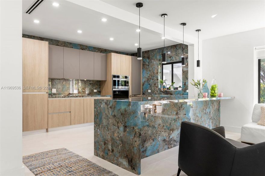 Located in the Village of El Portal, this fully renovated 4BD/3BA home offers 2,310 SF of modern living on an oversized double lot with over 14,000 sf. Interiors feature Elegant 32” x 72” large-format porcelain flooring and exclusive Italian porcelain countertops. Brand-new impact windows provide storm protection and energy efficiency. The expansive backyard offers ample space to build a resort-style pool and outdoor entertaining area. Situated on a quiet, tree-lined street just minutes from Miami Shores, the Design District, Wynwood, and Downtown. A rare opportunity to own a move-in-ready home on a true double lot in one of Miami’s most desirable residential enclaves.